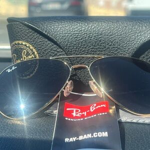 Ray-Ban Aviator Sunglasses with Black Lenses and Gold Frame